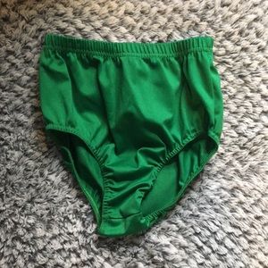 Green cheerleading spanks.